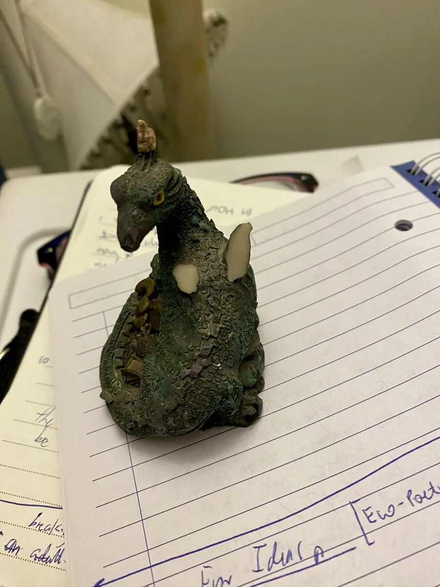 broken dragon figurine